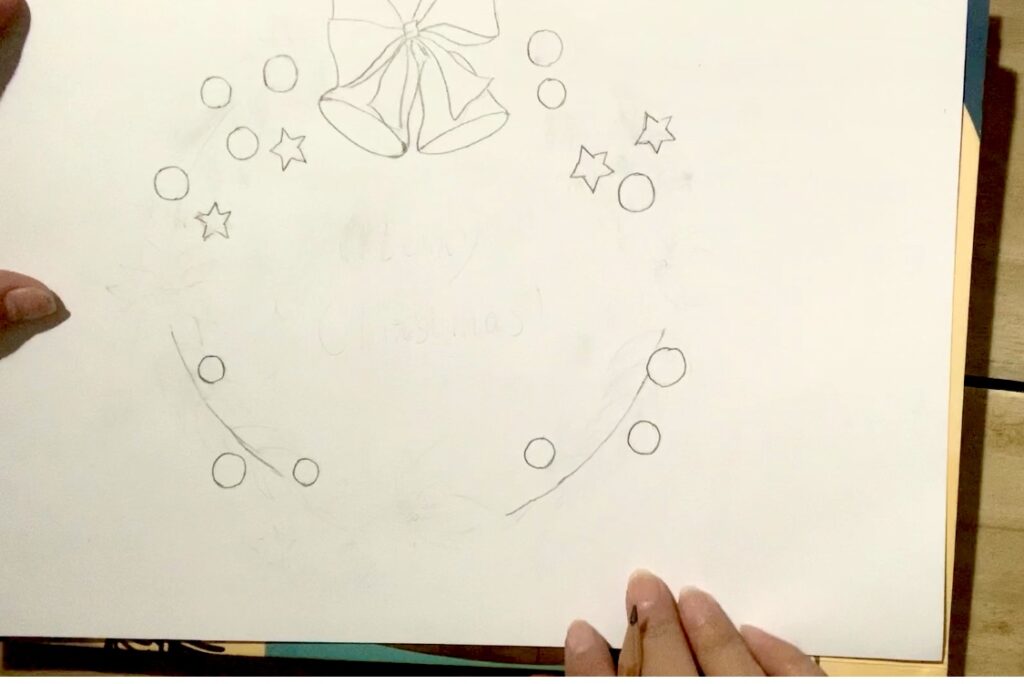 Bước 2: Vẽ hình tròn và ngôi sao để trang trí